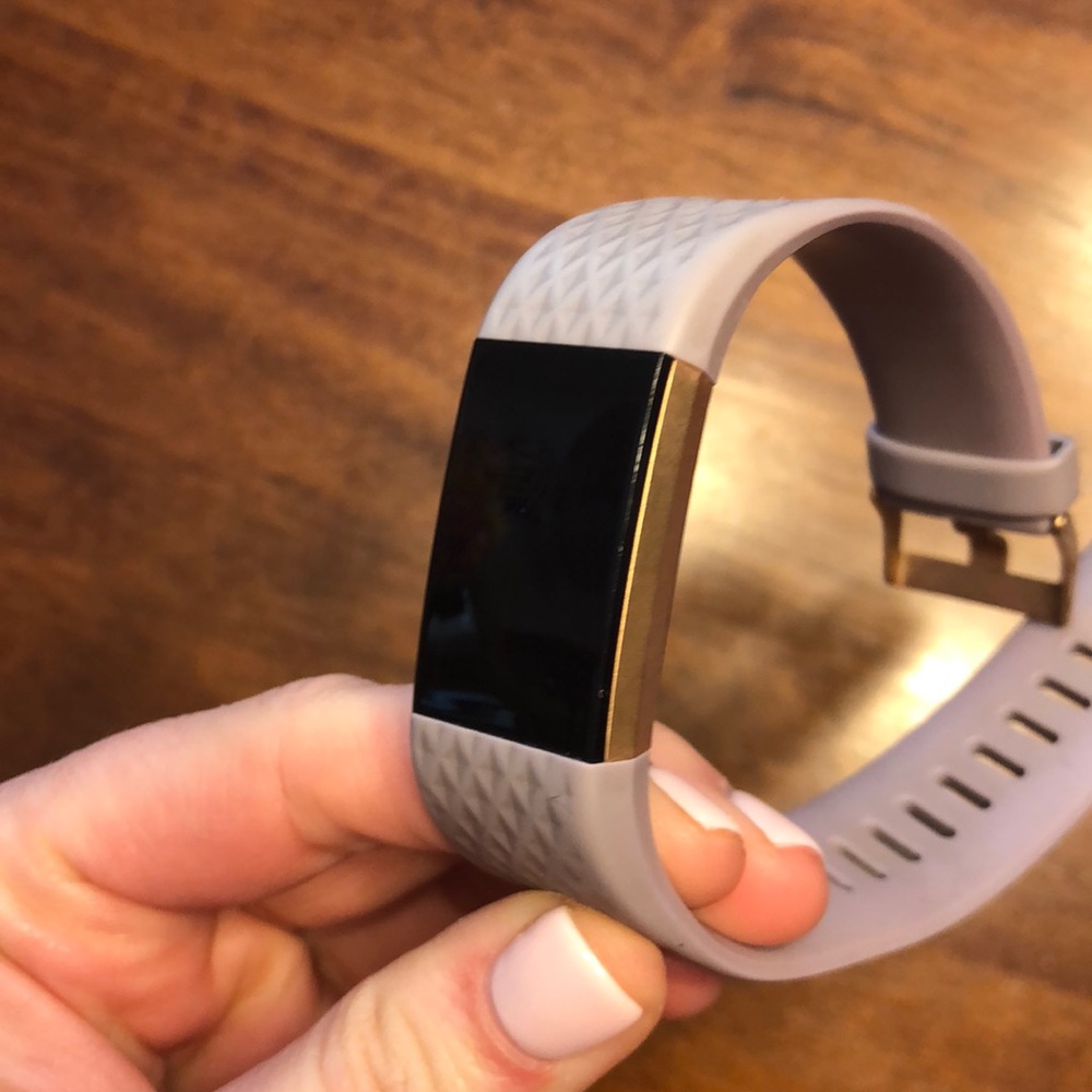 Rosegold and lavender Fitbit Charge 2